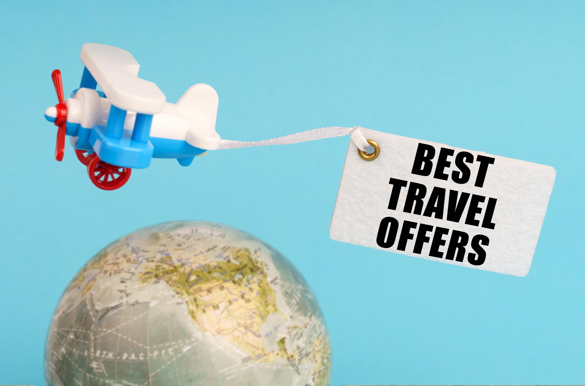 On a blue background, a globe and an airplane with a sign - Best Travel OFFERS