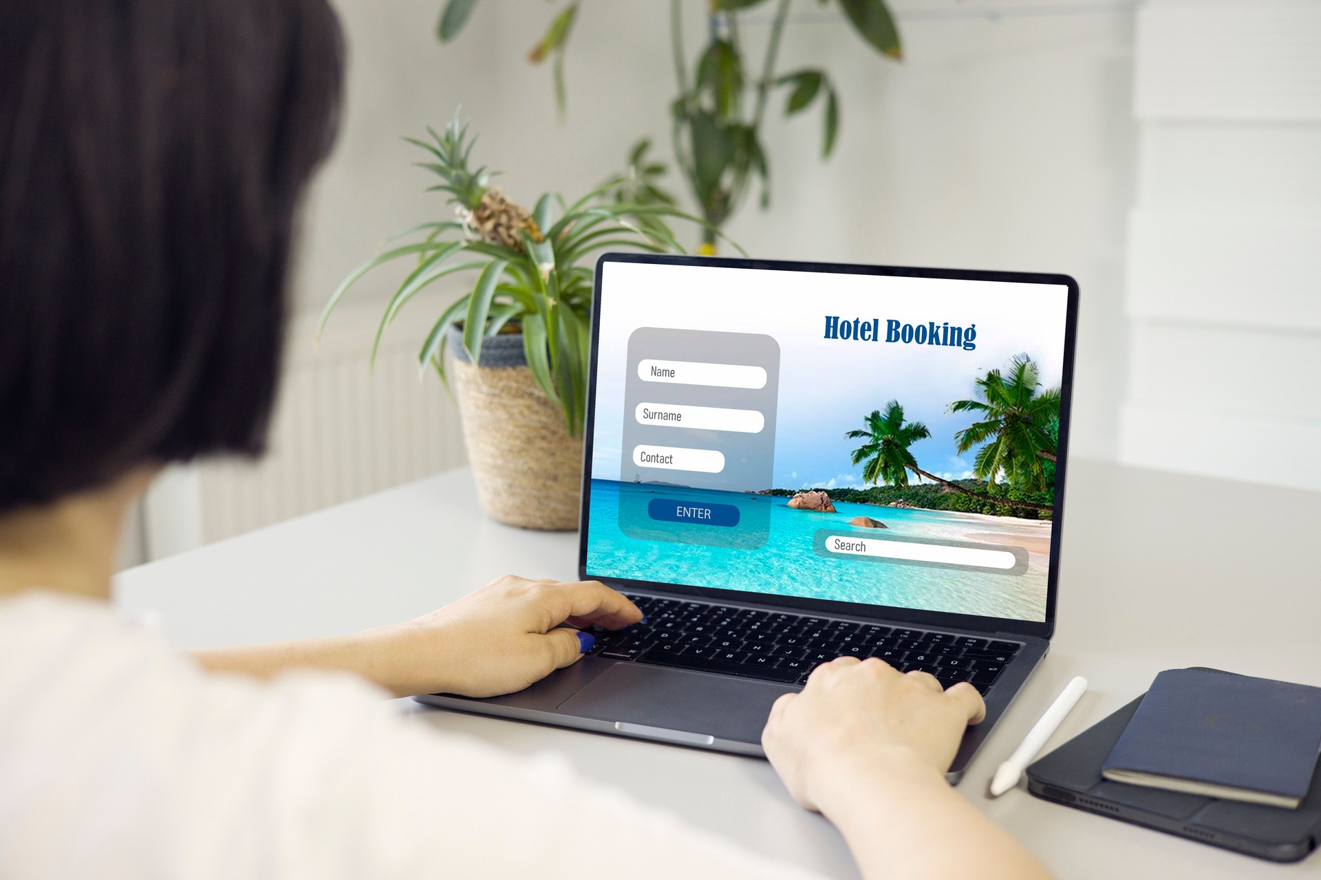 Woman using laptop and making hotel booking on website. Online reservation and travel concept