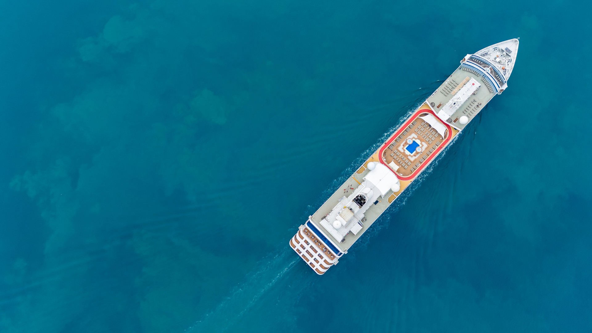 Aerial view of beautiful white cruise ship above luxury cruise in the ocean sea at early in the morning time concept smart tourism travel on holiday vacation time on summer