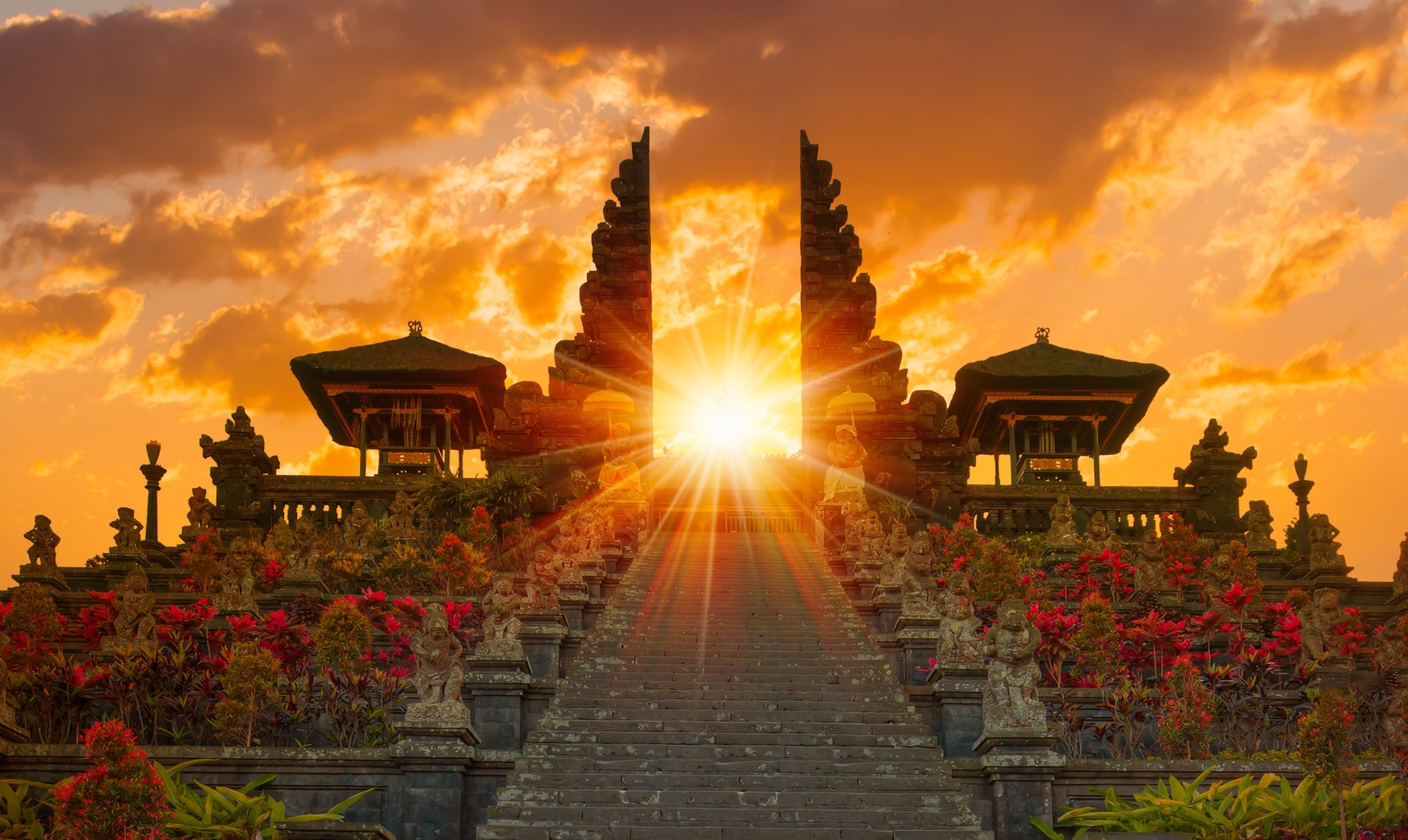 Pura Besakih temple on the slopes of Mount Agung largest and holiest temple at sunset - Bali, Indonesia Pura Besakih temple on the slopes of Mount Agung largest and holiest temple at sunset - Bali, Indonesia