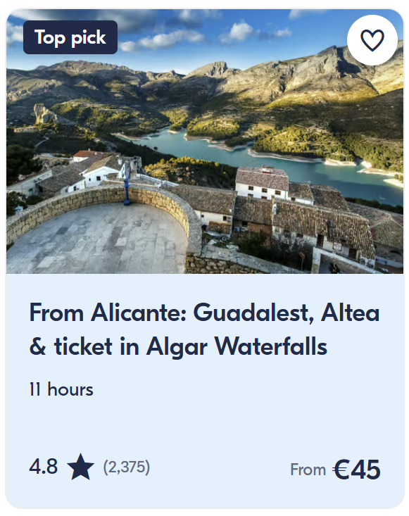 Panoramic mountain and reservoir view near Guadalest village with scenic viewpoint – full-day tour including Algar Waterfalls ticket.