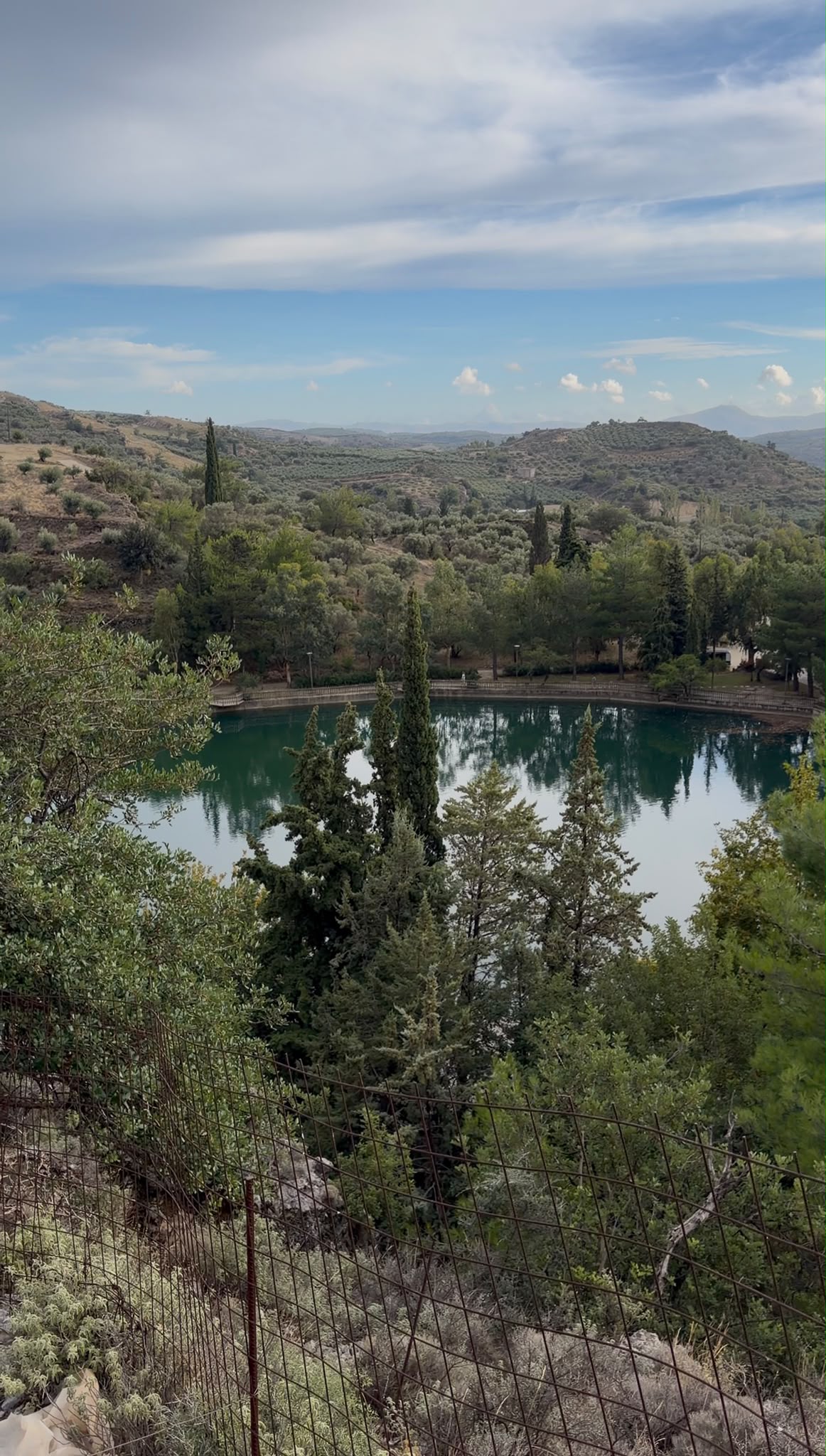 Zaros Lake surrounded by mountains in Crete